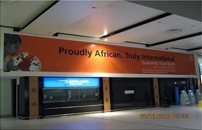 GTBank’s “Proudly African, Truly International” fascia running the width of the arrivals concourse at OR Tambo, Johannesburg.